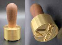 brass stamp with black walnut handle